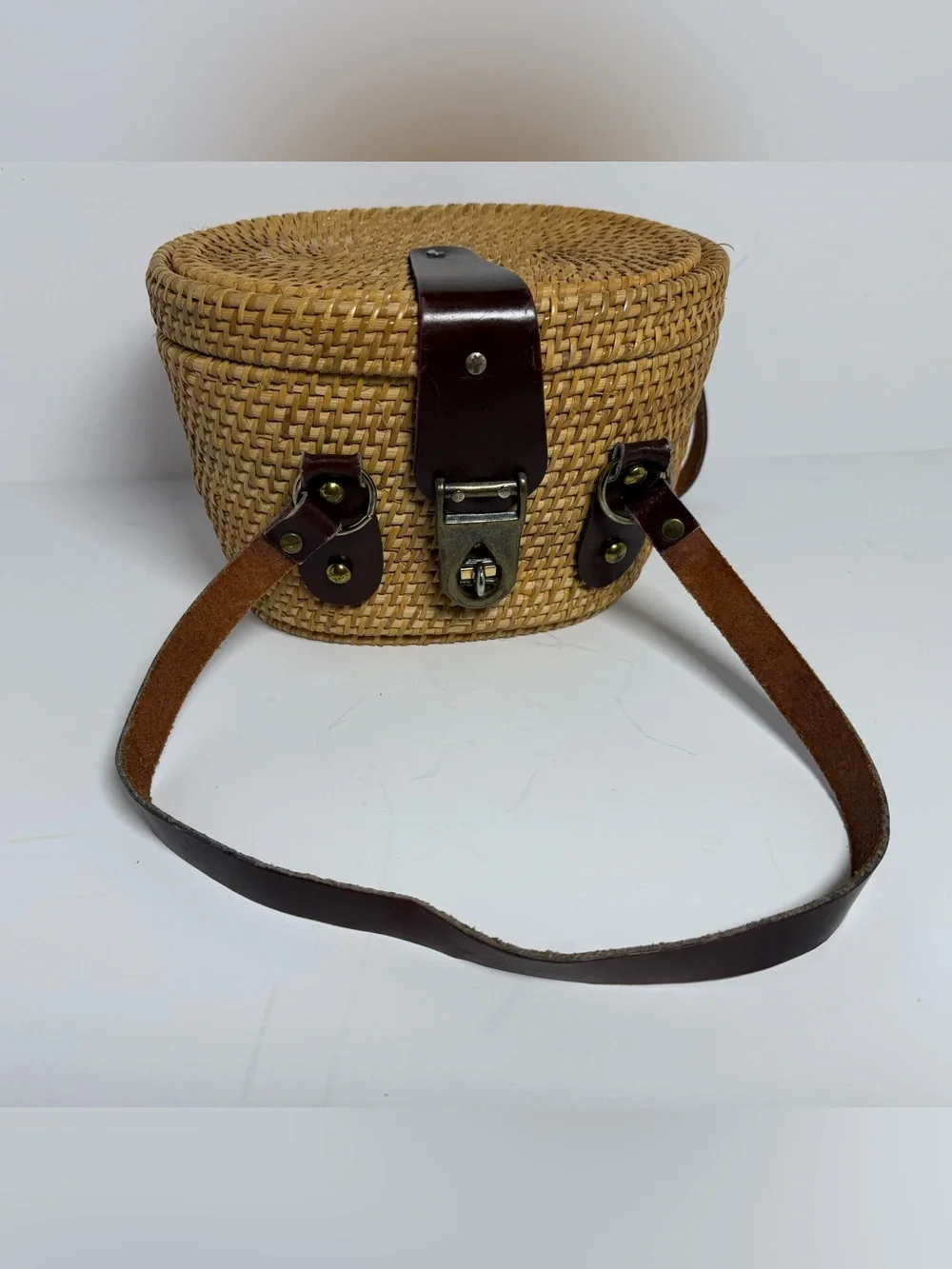 Woven Straw Round Crossbody Bag with Brown Leather Trim
